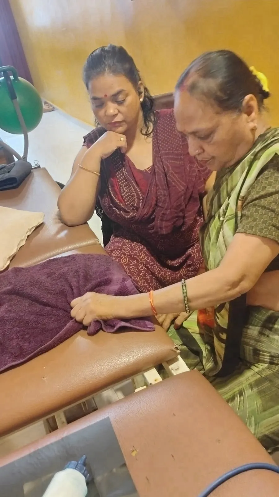 Dr. Deepti consulting a patient